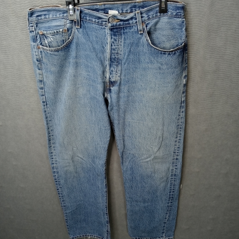 Levis 501XX men's button fly blue jeans. Sz 38x34.tear in seat. See last pic. M2
